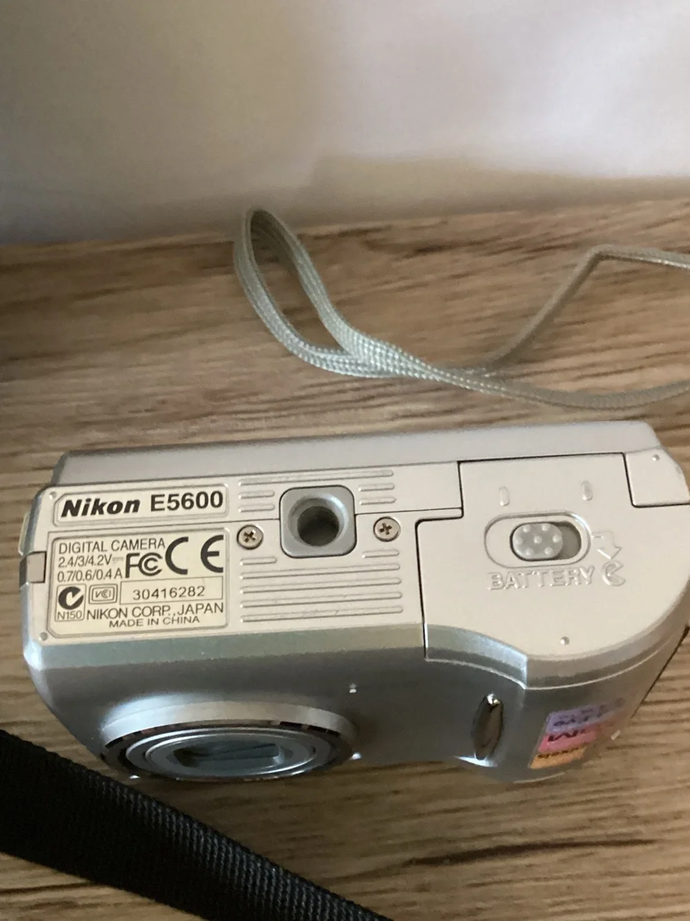 Nikon Silver Compact Digital Camera with Black Carrying Pouch